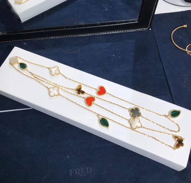 van cleef arpels lucky alhambra long necklace 12 motifs yellow gold mother of pearl malachite tiger eye carnelian 62085b00420aa